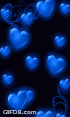 Blue Hearts On A Black Background With The Website Reddeco.com At The Bottom GIF