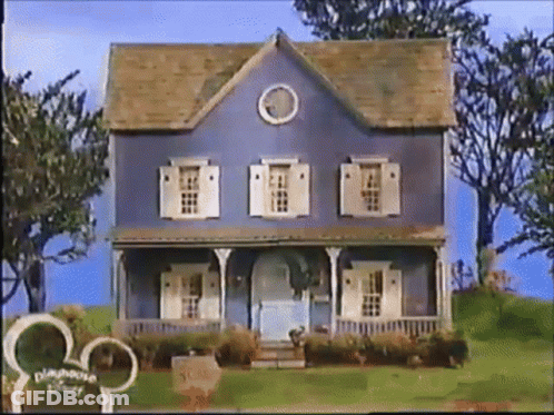 Blue House With White Shutters GIF