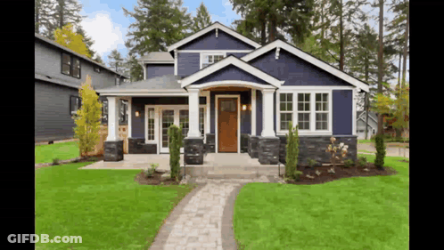 Blue House With White Trim And Brick Walkway GIF