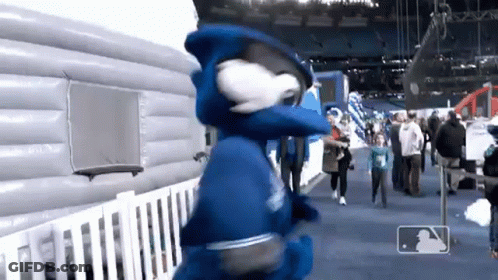 Blue Jay Mascot Standing In Front Of Crowd GIF