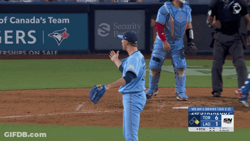 Blue Jays Pitcher On Mound In Front Of Security Bank Ad GIF
