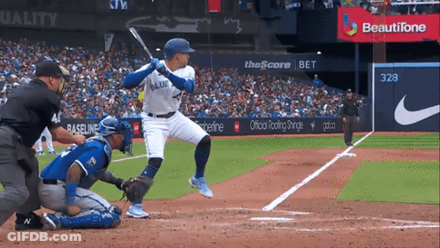 Blue Jays Player Swinging At Pitch GIF