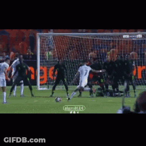 Blue Jersey #16 Soccer Player Diving Into Goal GIF