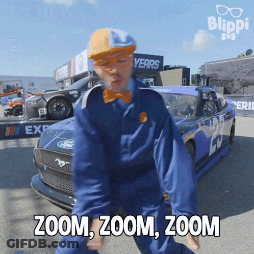 Blue Jumpsuit Man Dancing By Race Car Zoom Zoom Zoom GIF
