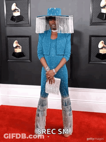 Blue Jumpsuit Person On Red Carpet Saying Srec Sm GIF