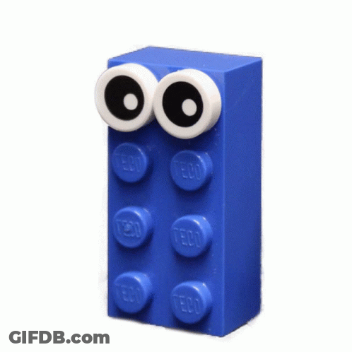 Blue Lego Brick With Googly Eyes And Teco GIF