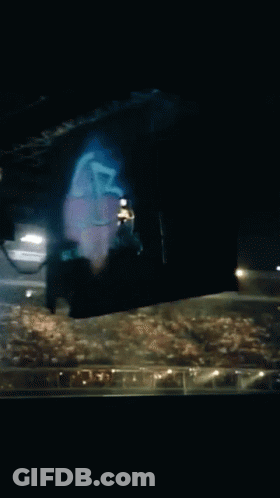 Blue Light Shining In Dark Room GIF
