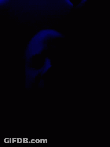 Blue Light Shining On Dark Blue Background GIF