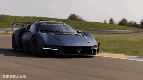 Blue Maserati Sports Car On Race Track GIF