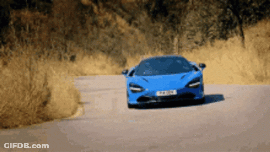 Blue Mclaren Supercar Accelerating GIF