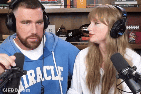 Blue Miracle Sweatshirt Man Talking To Headphone Woman GIF