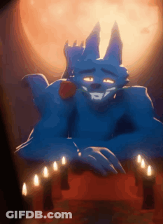 Blue Monster With Rose In Mouth Sitting In Front Of Candles GIF