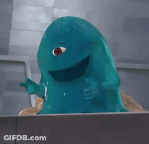 Blue Monster With White Eye Standing On Sand GIF