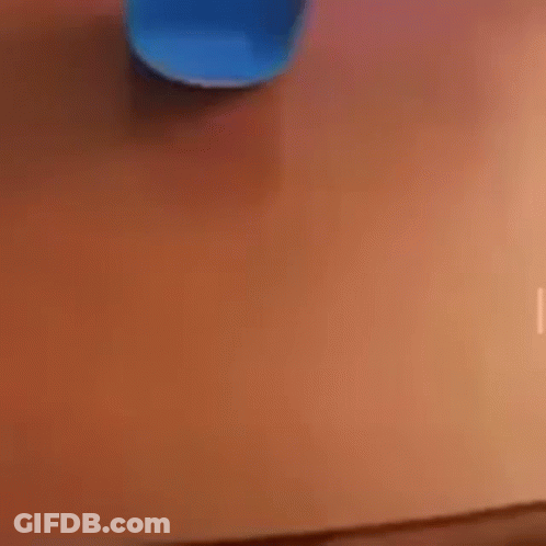 Blue Object Applied To Skin Close Up GIF