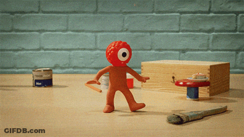 Blue Paint Can Next To Red Toy GIF