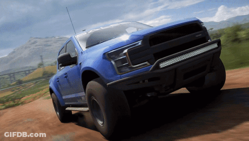 Blue Pickup Truck Driving Down Dirt Road GIF
