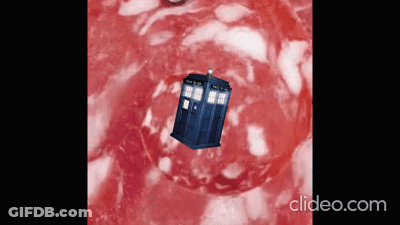 Blue Police Box Floating In Red Liquid GIF