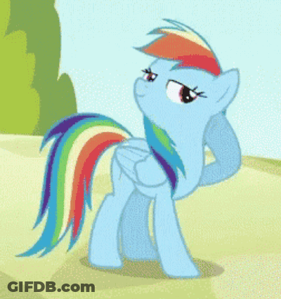 Blue Pony With Rainbow Tail Standing On Dirt Road GIF