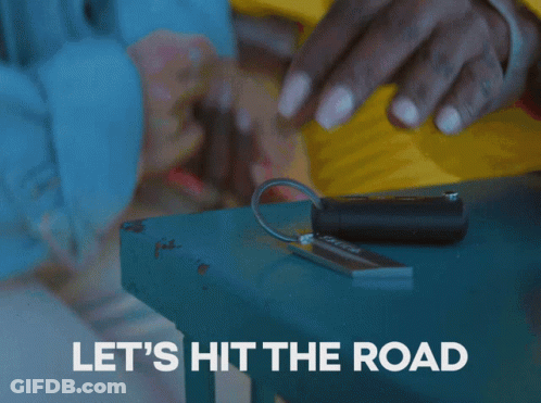 Blue Race Car Driving Down Road GIF