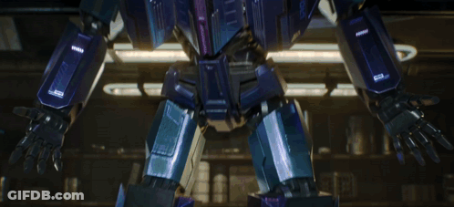 Blue Robot With Purple Chest Stripe GIF