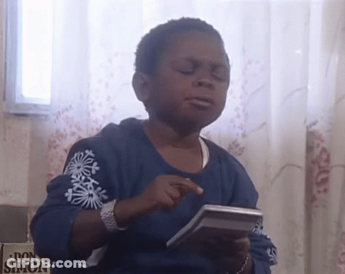 Blue-Shirt Boy Holding Calculator At Don Simon GIF
