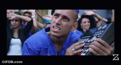 Blue Shirt Man Holding Keyboard With Letter Z GIF