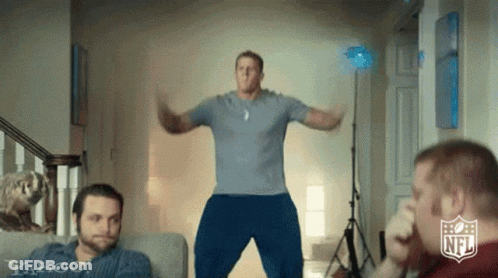Blue Shirt Man Jumping In Front Of Men GIF