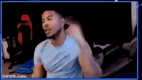 Blue Shirt Man Making Funny Face At Computer GIF