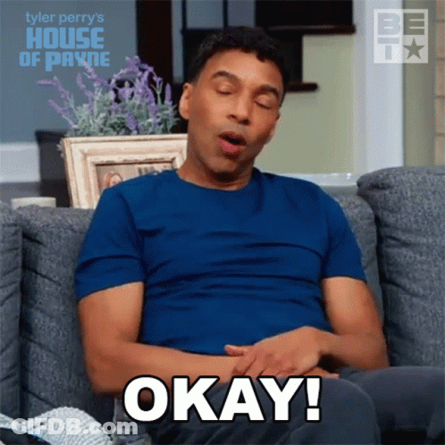 Blue Shirt Man On Couch Says Okay GIF