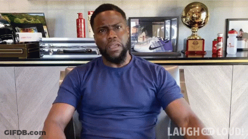 Blue Shirt Man Sitting At Laugh At Loud Sign GIF