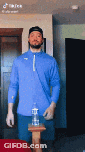 Blue Shirt Man With Gloves And Water Bottle GIF