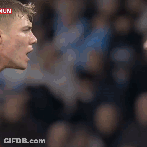 Blue Shirt Man Yelling Mun At Red Shirt Man GIF
