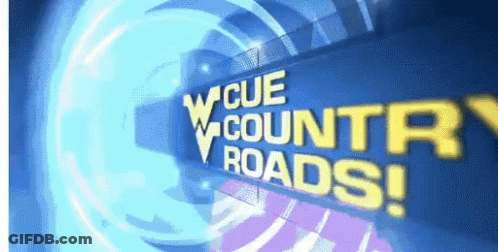 Blue Sign Saying Cue Country Roads GIF