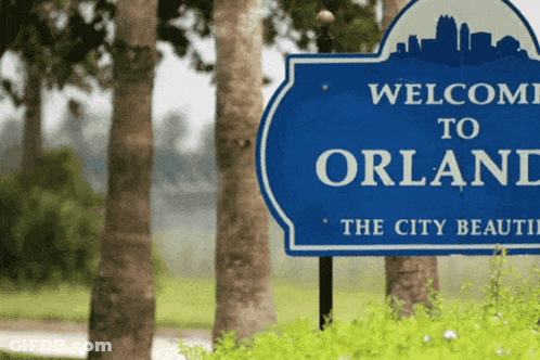 Blue Sign Saying Welcome To Orland GIF