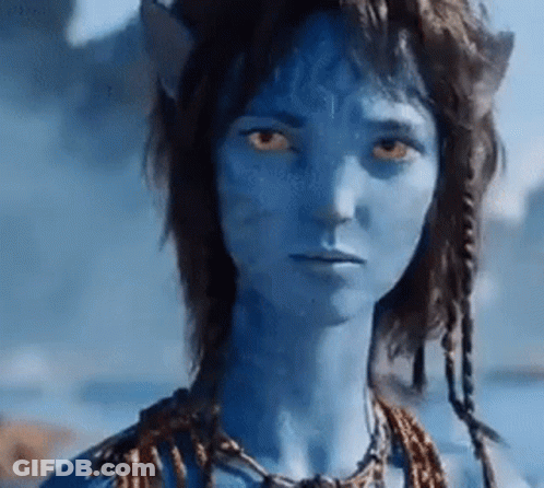Blue Skin Woman With Yellow Eyes And Necklace GIF