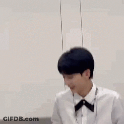 Blue Smiley Face With Hand Pointing GIF