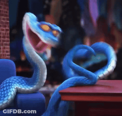 Blue Snake Sitting On Couch Mouth Open GIF