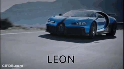 Blue Sports Car Driving Down Road With Leon GIF