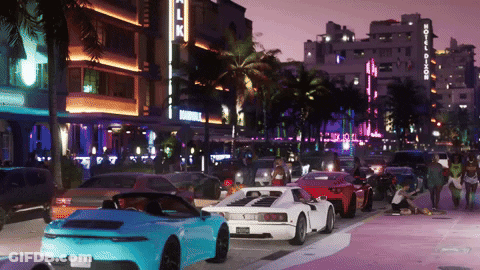 Blue Sports Car Parked In Front Of Hotel GIF