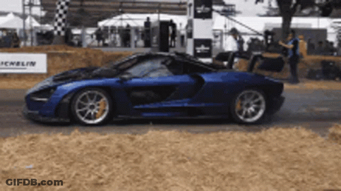 Blue Sports Car With License Plate P14 00V GIF