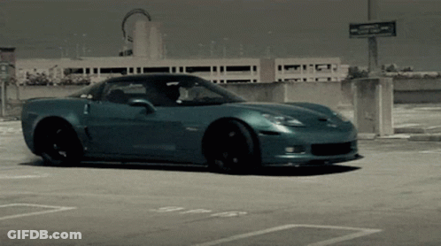 Blue Sports Car With Valet Sign GIF