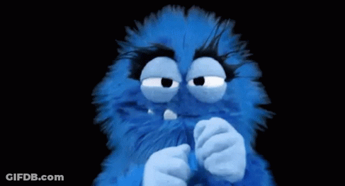 Blue Stuffed Animal Covering Mouth GIF