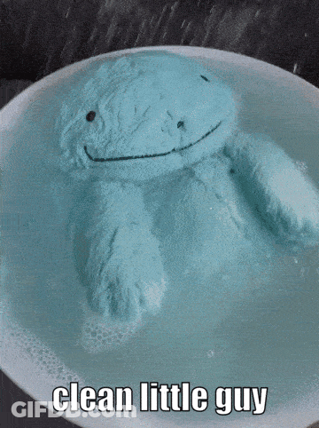 Blue Stuffed Animal Floating In Water Saying Clean Little Guy GIF