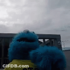 Blue Stuffed Animal In Yellow Shirt Saying Off GIF
