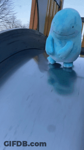 Blue Stuffed Animal On Table GIF