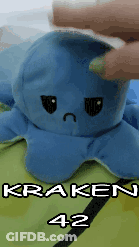 Blue Stuffed Octopus With Sad Face Being Held GIF
