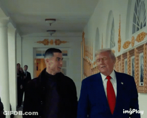 Blue Suit Man Talks To Black Jacket Man GIF