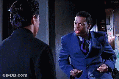 Blue Suit Man With Tie Talking To Black Suit Man GIF