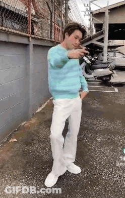 Blue Sweater Man White Pants Parking GIF