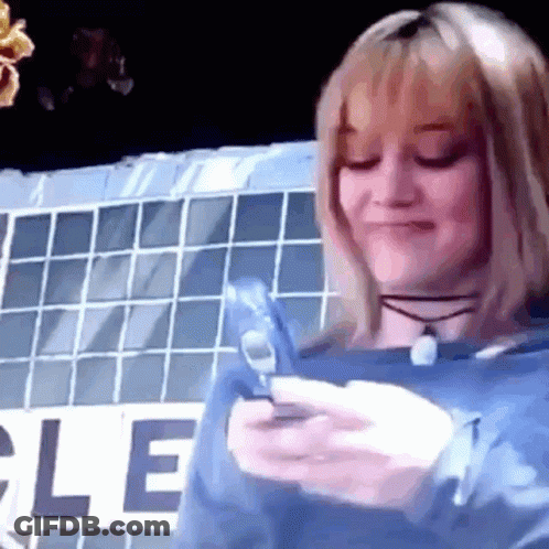 Blue Sweatshirt Woman With Phone By Le Sign GIF